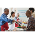 volunteers serving food